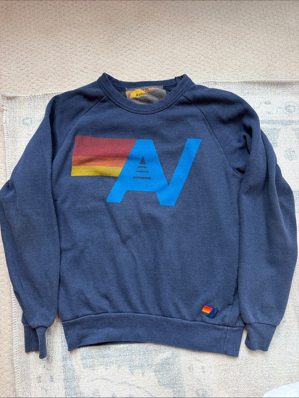 Aviator Nation Navy Crewneck with Blue AV and Red-Orange-Yellow Stripe